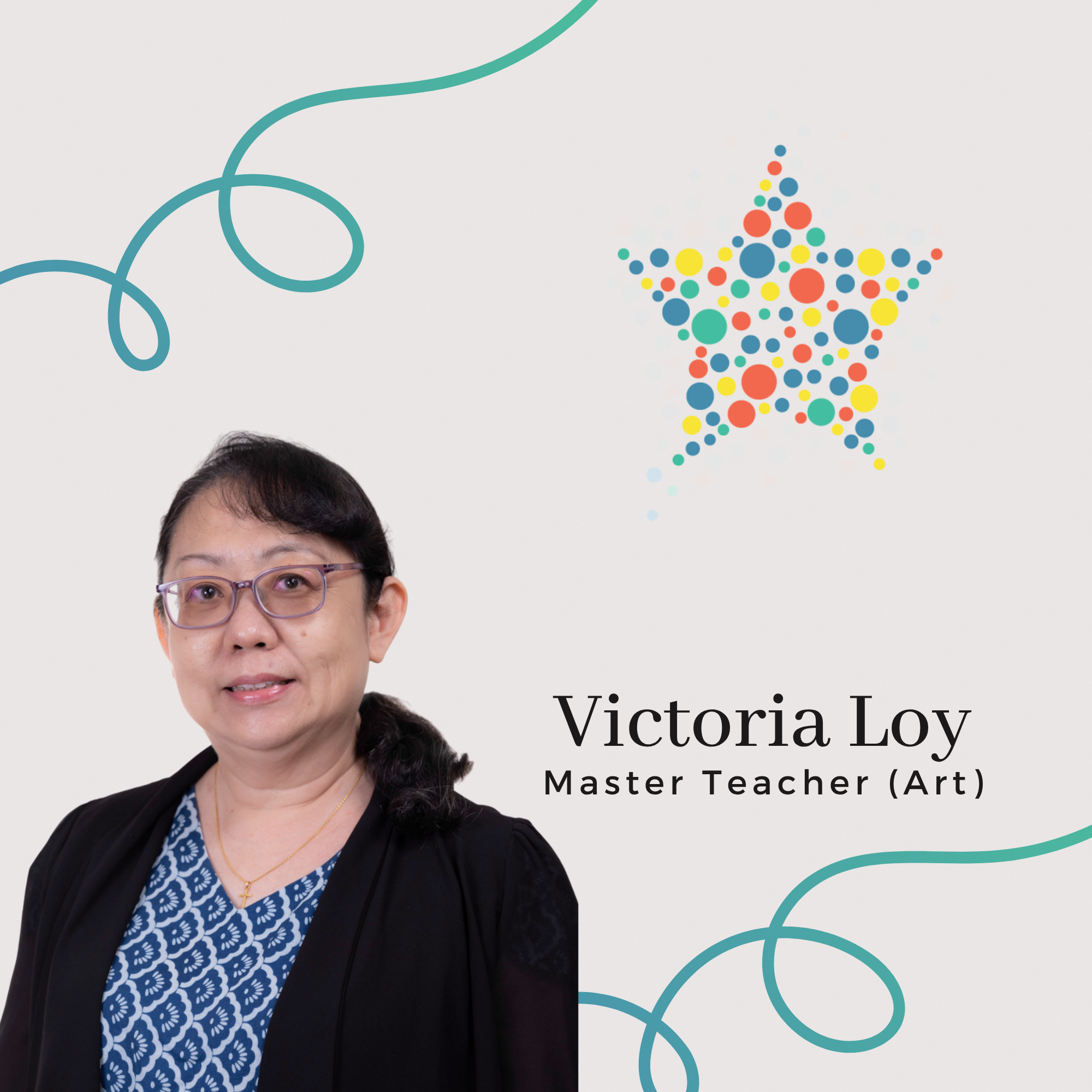 Profile photo of Victoria Loy, Master Teacher (Art). A portrait of her with dark hair tied back, wearing glasses, a patterned blue top and a black cardigan.